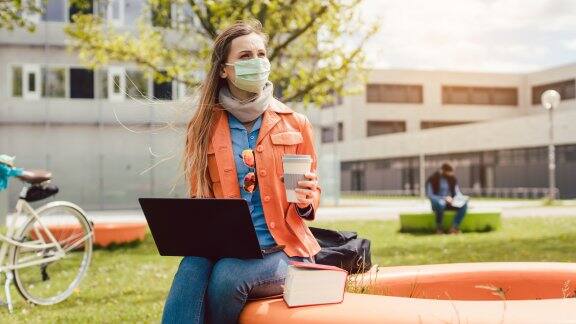 student at university campus during covid-19